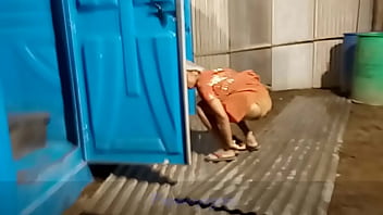 women pissing in toilet